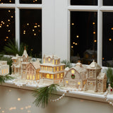 Mistletoe Park Light-Up Cottage & Caroler Figurine